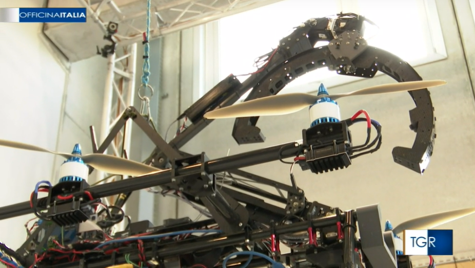 a frame from the video showing the hybrid robot with its pipe inspection tool